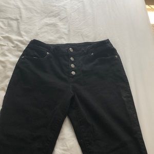 Button fly raw edge skinny jeans